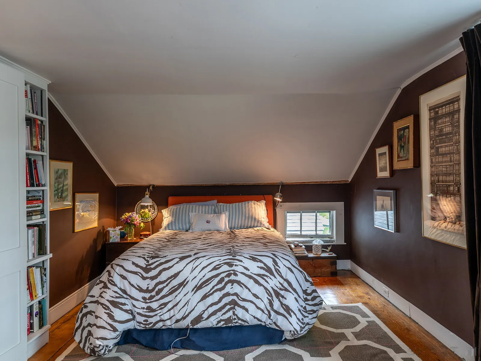 Main-house bedroom beneath the eaves